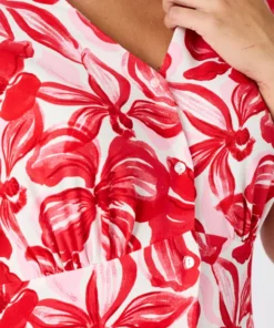 Robe tissu crêpe manches papillon